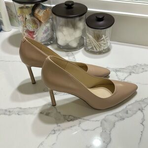 Nine West nude pump
